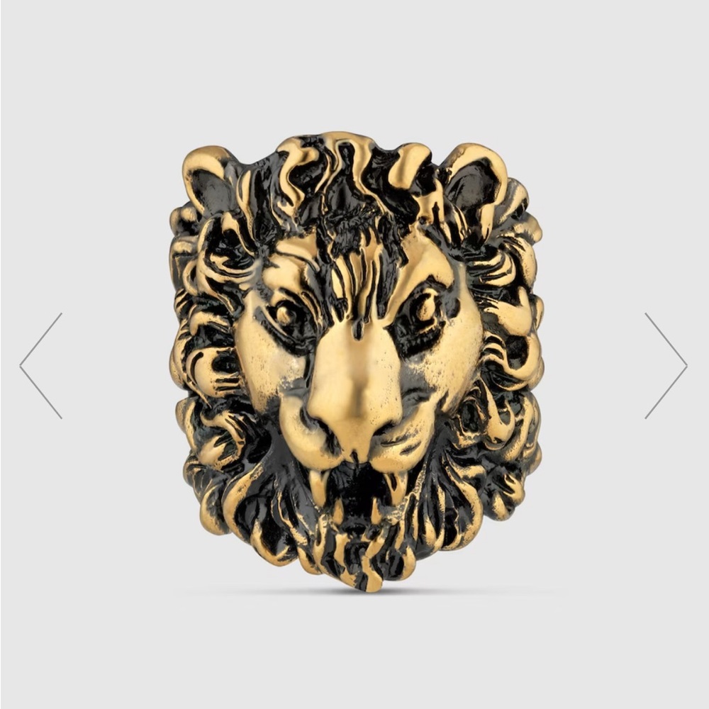 Authentic GUCCi ring! Lion head logo! Rare find. Size Gucci 23.